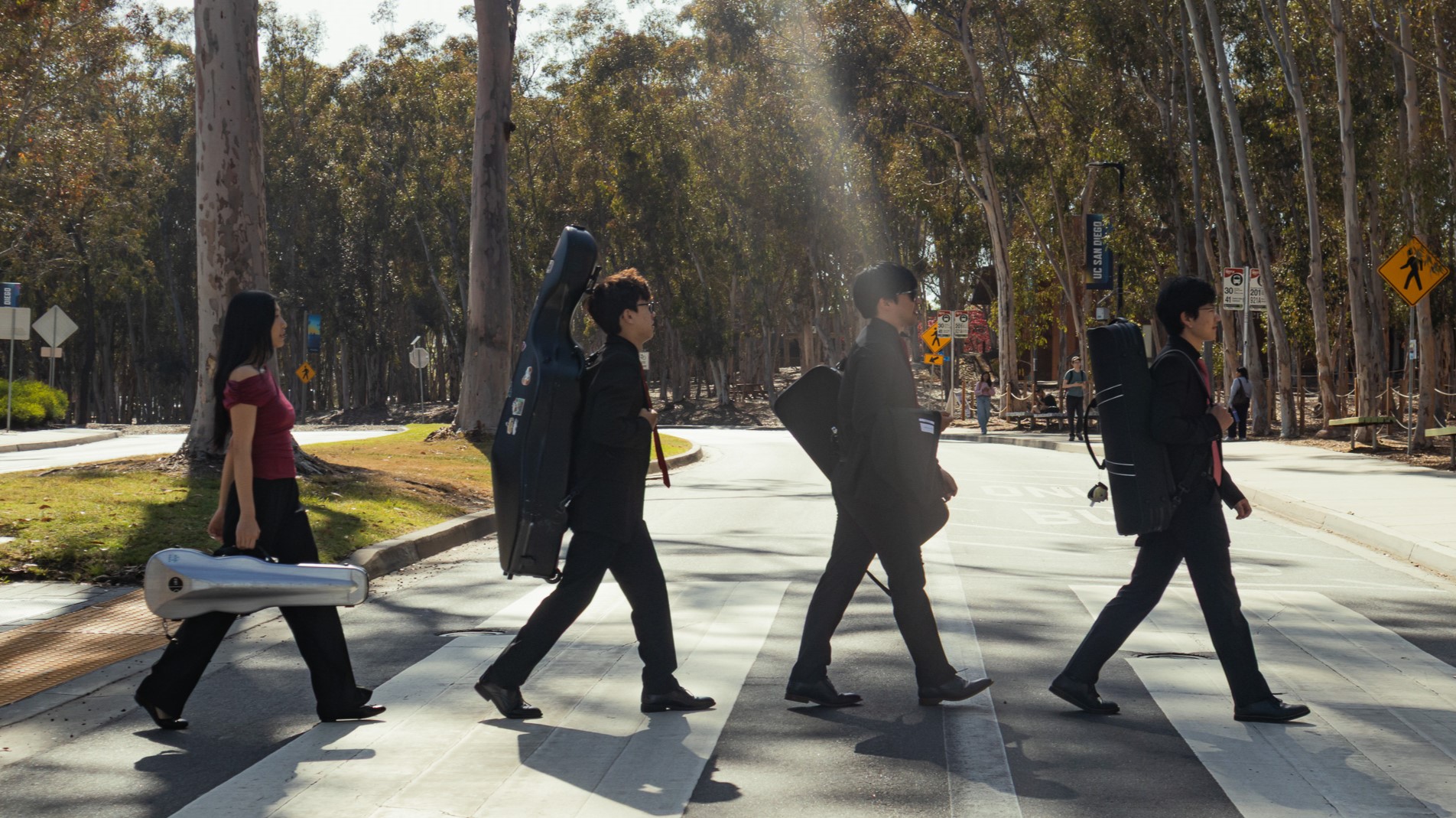 The Anatole Quartet walking on campus